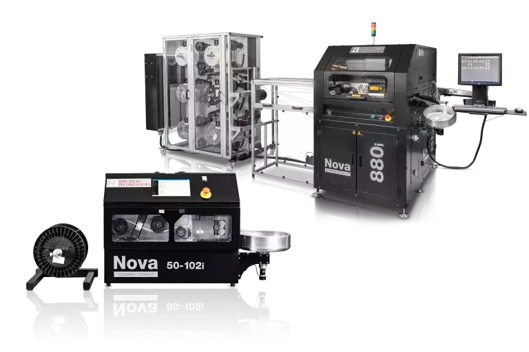 Two black machine one is silver for wire processing